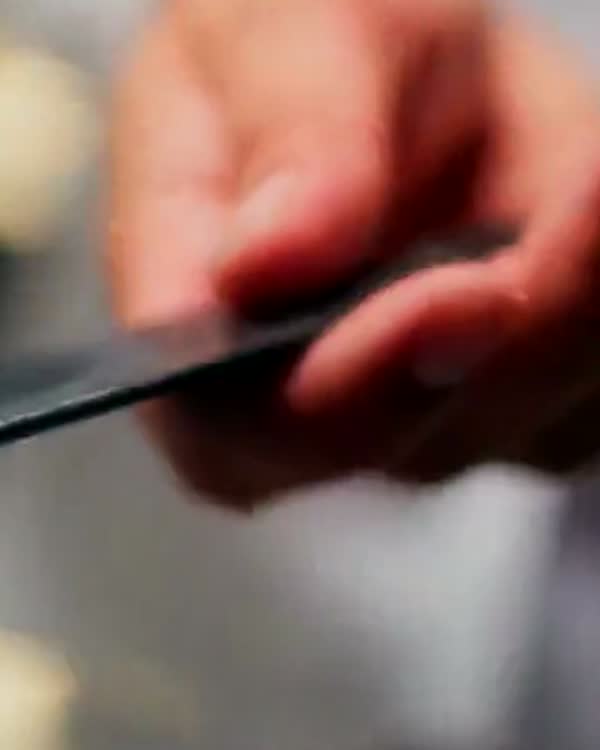Tweezers over a pan