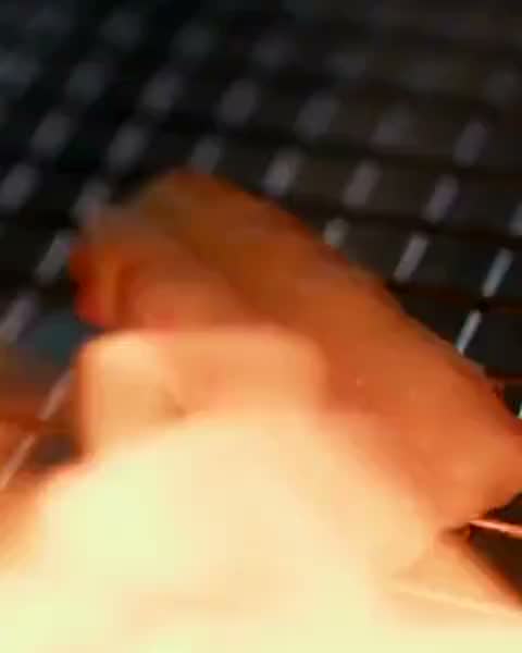 Flames over a grill, in motion