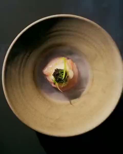 Smoke drifting over a plate